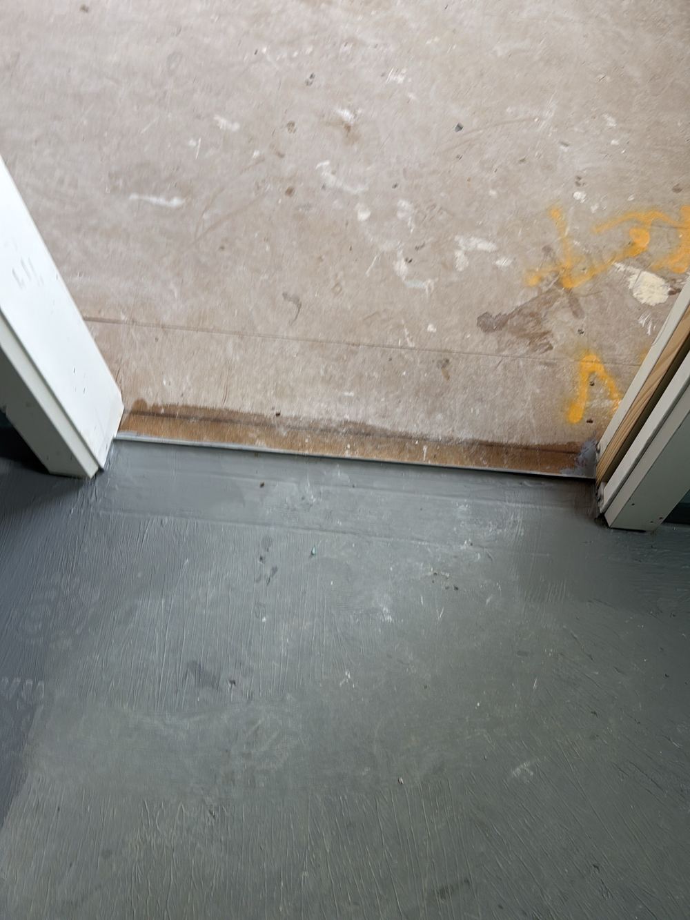 Water stop angle at the ensuite door not run fully to the frame, found during a fixing inspection in Pakenham