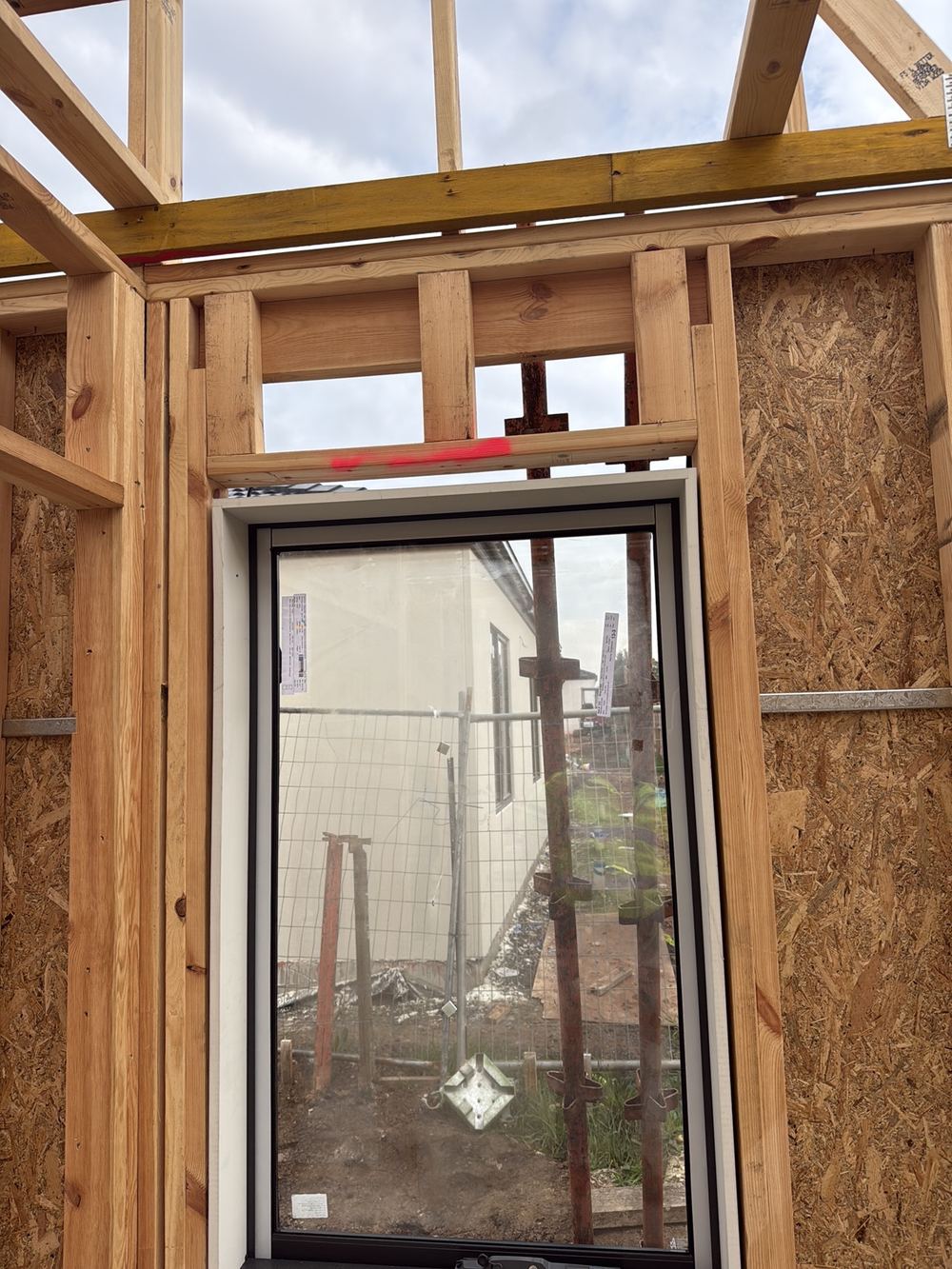 Window opening over 25mm wider than the frame, leaving the architraves unsupported, Pakenham