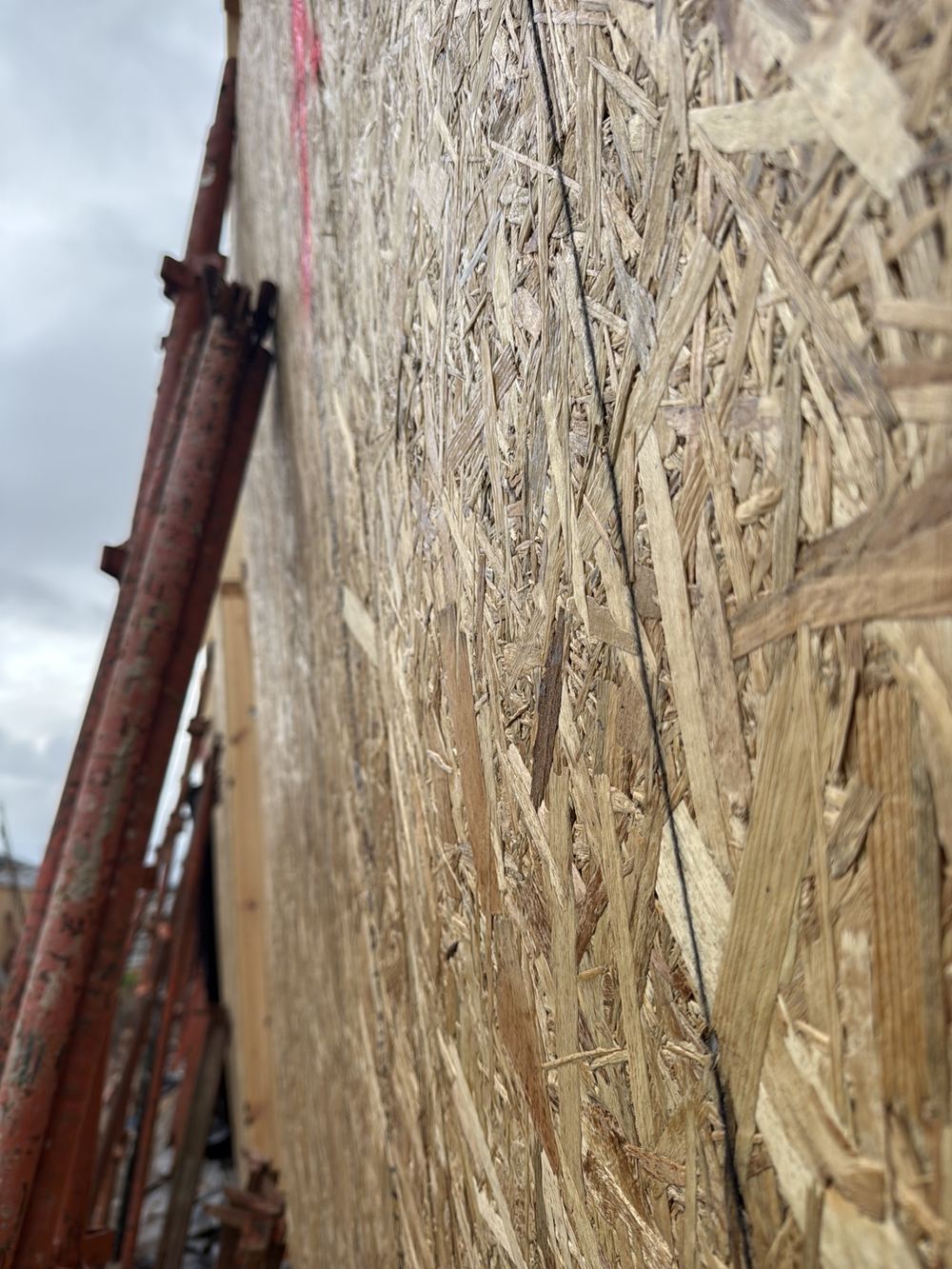 Plywood bracing sheet bulging out of plane across the wall, found during a frame inspection in Pakenham