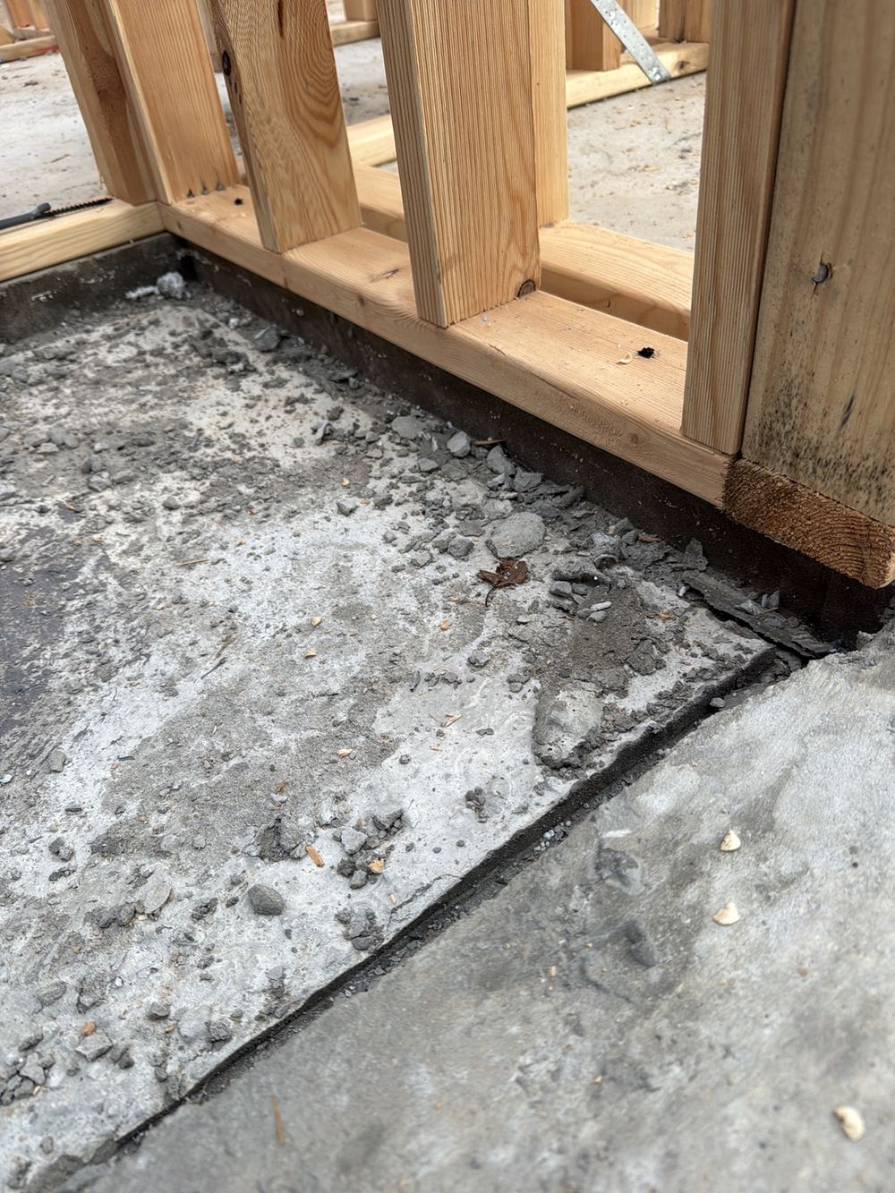 Concrete wet area recess running under the wall frame instead of in line with it, Pakenham