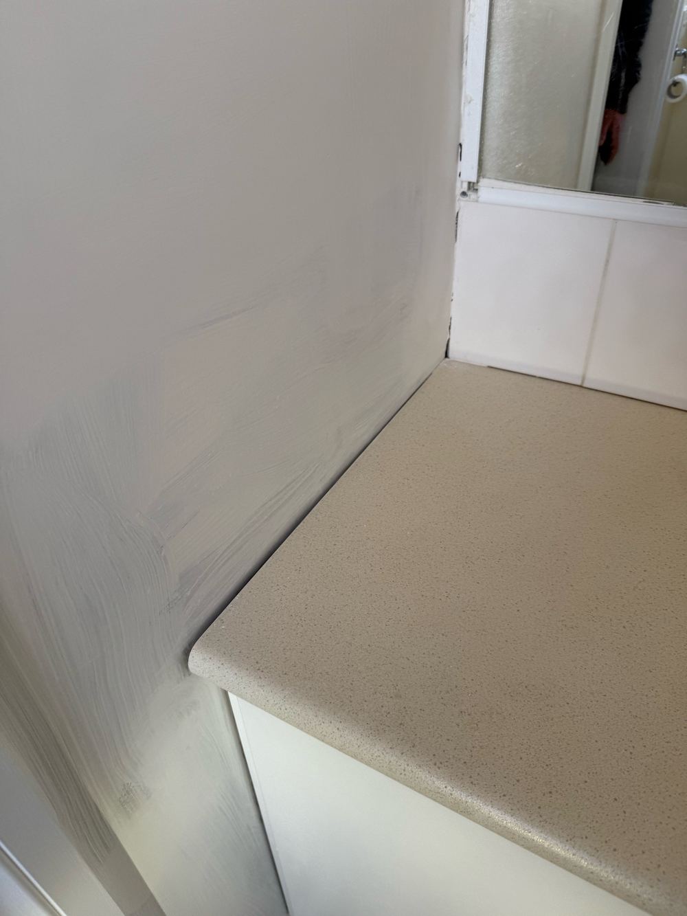 Vanity put back without sealing, leaving gaps at the splashback and basin, found during a insurance repair inspection in Pakenham