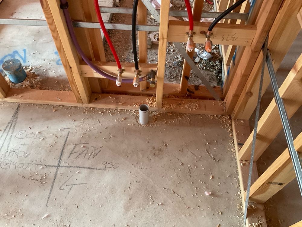 Sewer pipes left uncapped at lock-up, open to falling debris, found during a lock-up inspection in Pakenham
