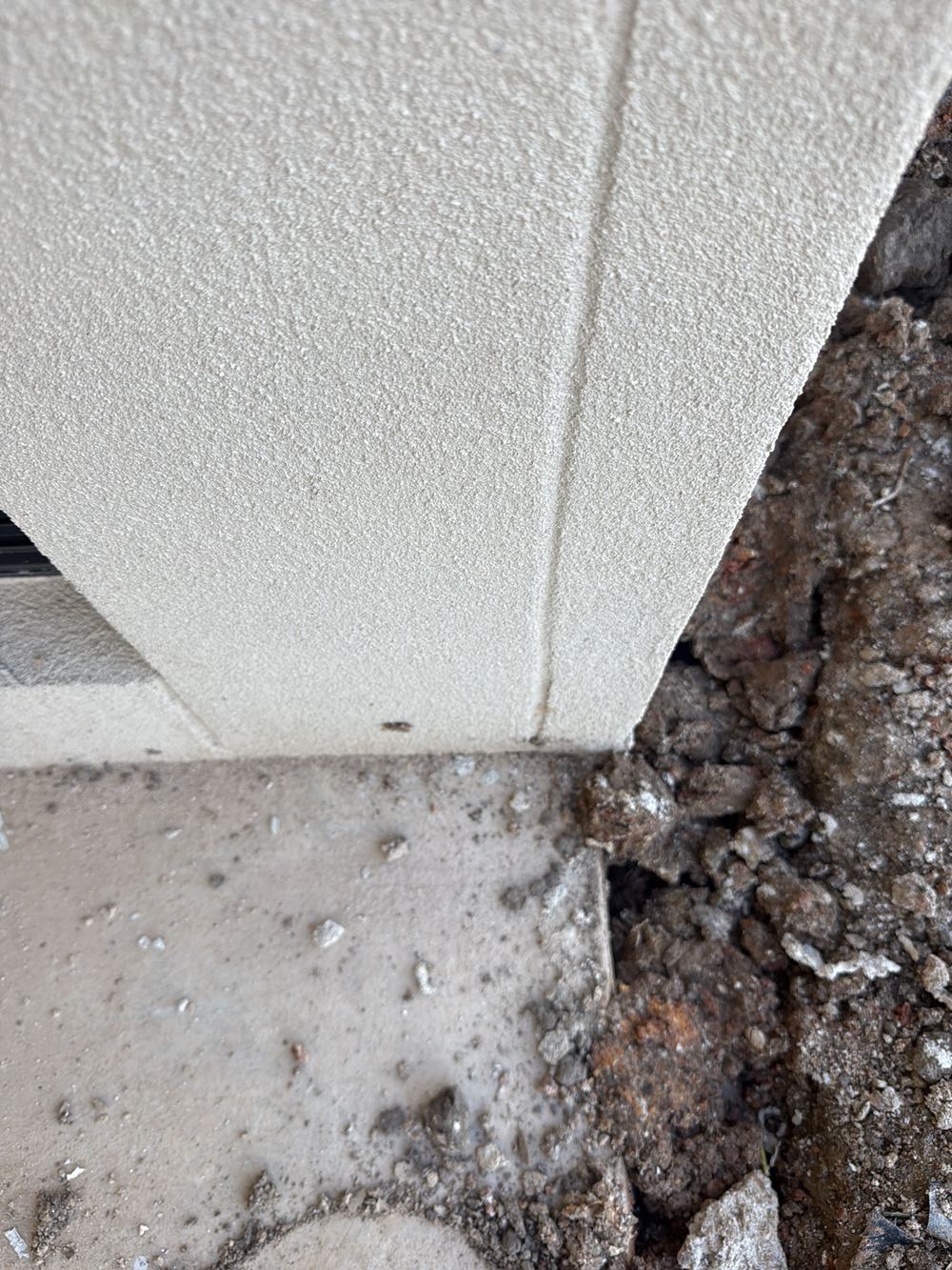 Control joint in the panel cladding not straight or continuous down the wall, found during a pre-handover inspection in Pakenham