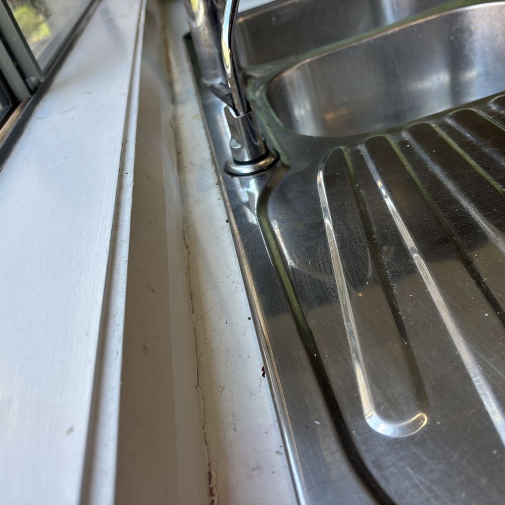 Sink to benchtop junction missing sealant, so water can reach the cabinet below, found during a pre-purchase inspection in Pakenham