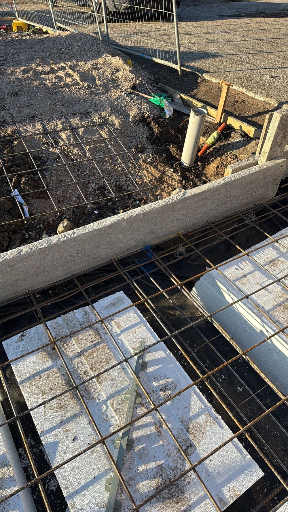 Loose bars at a beam corner that could shift as concrete goes in, found during a slab pre-pour inspection in Cranbourne East